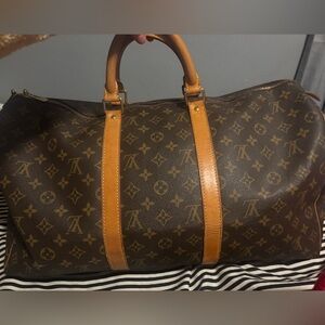 Authentic Louis Vuitton Monogram Duffel in Brown and Tan